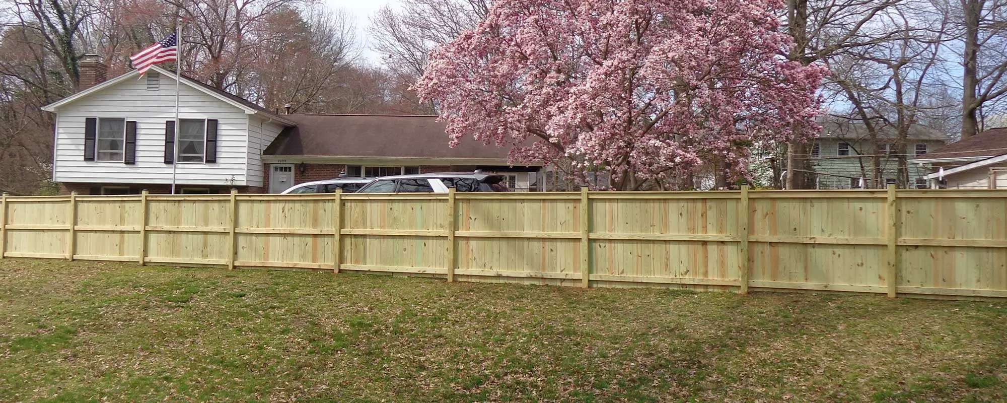 Wood privacy fence installed in front yard
